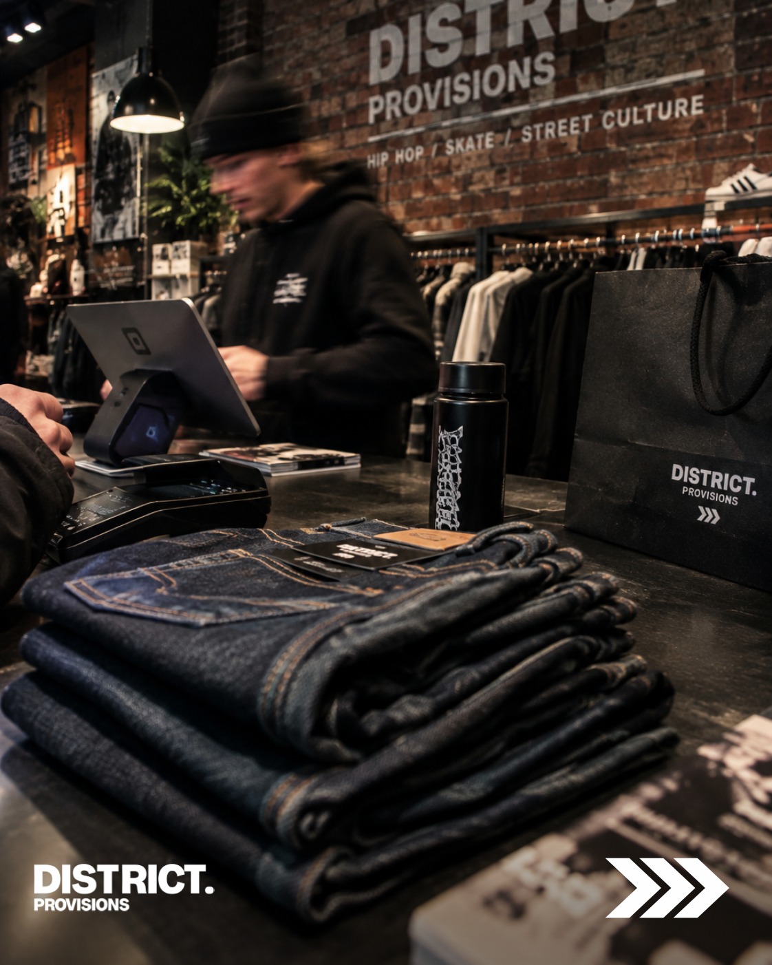 DISTRICT. PROVISIONS shop counter and clothing